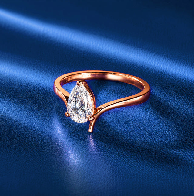 Pear Cut Bypass Solitaire Ring