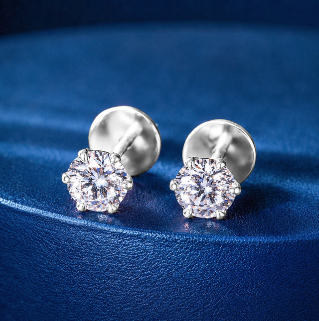 Round Brilliant Solitaire Stud Earrings — White Gold (Large)