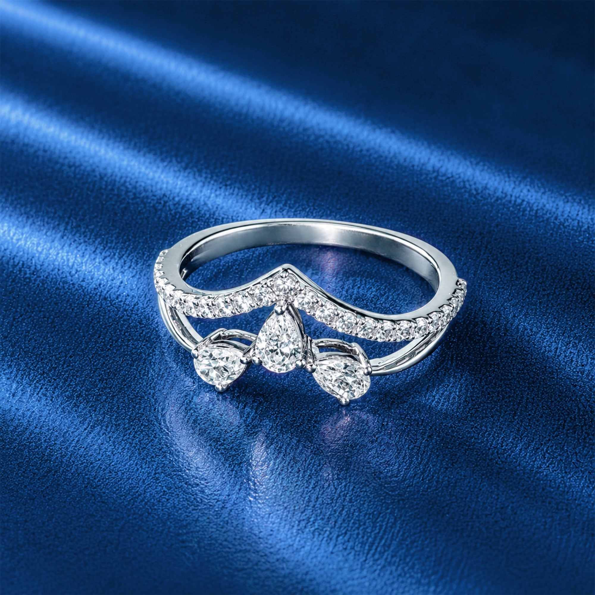 Pear Cut Triple Stone Chevron Crown Ring