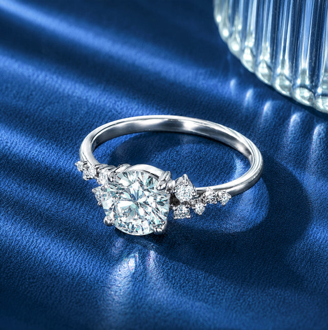 Round Brilliant Asymmetric Cluster Solitaire Ring