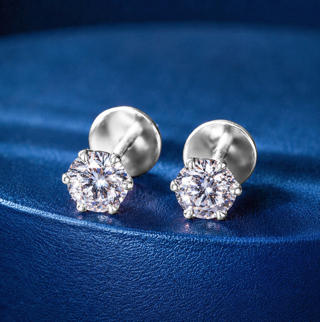 Round Brilliant Solitaire Stud Earrings — White Gold