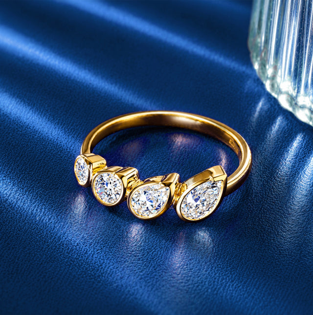 Pear Cut Five-Stone Bezel Band Ring
