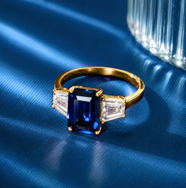 Emerald Cut Sapphire Trapezoid Diamond Three-Stone Ring