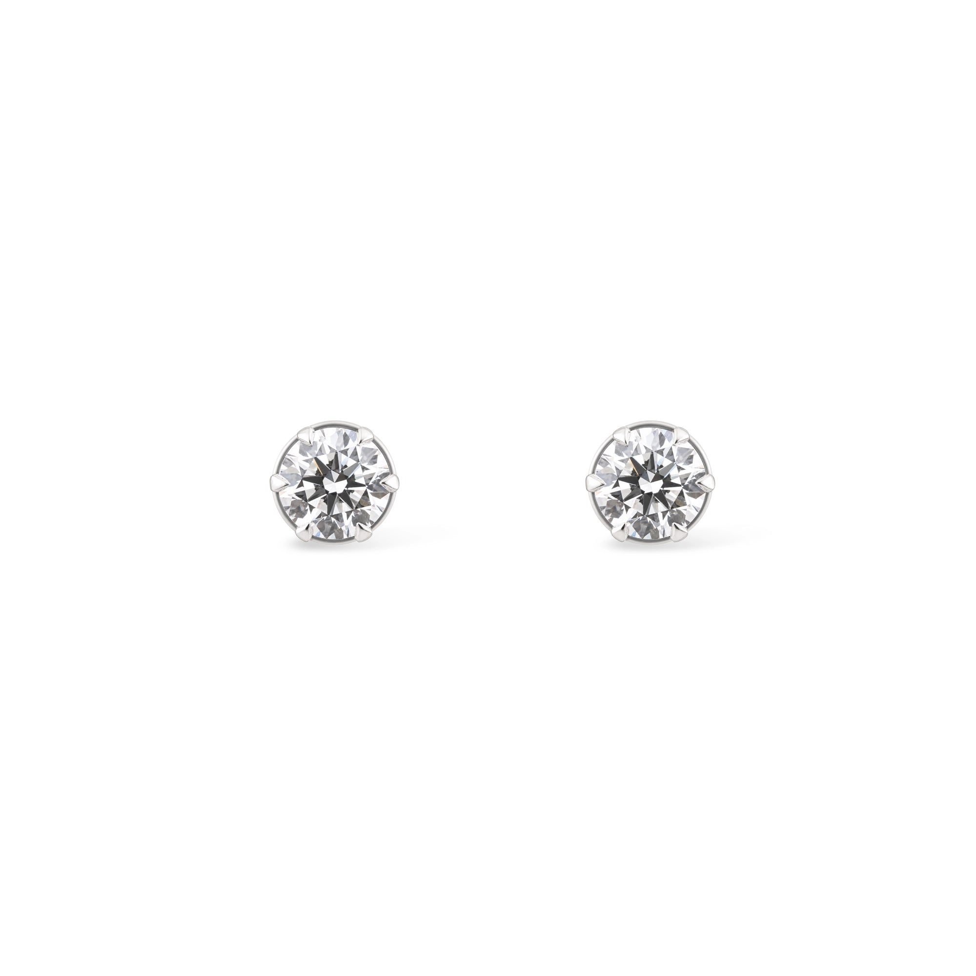 Round Brilliant Solitaire Stud Earrings — White Gold (Large)