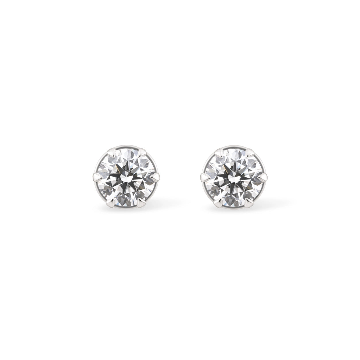 Round Brilliant Solitaire Stud Earrings — White Gold