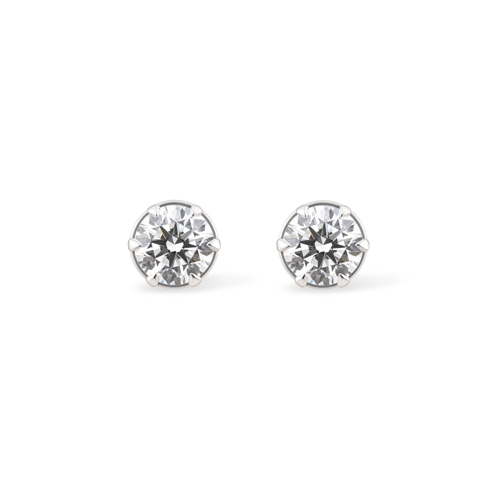 Round Brilliant Solitaire Stud Earrings — White Gold